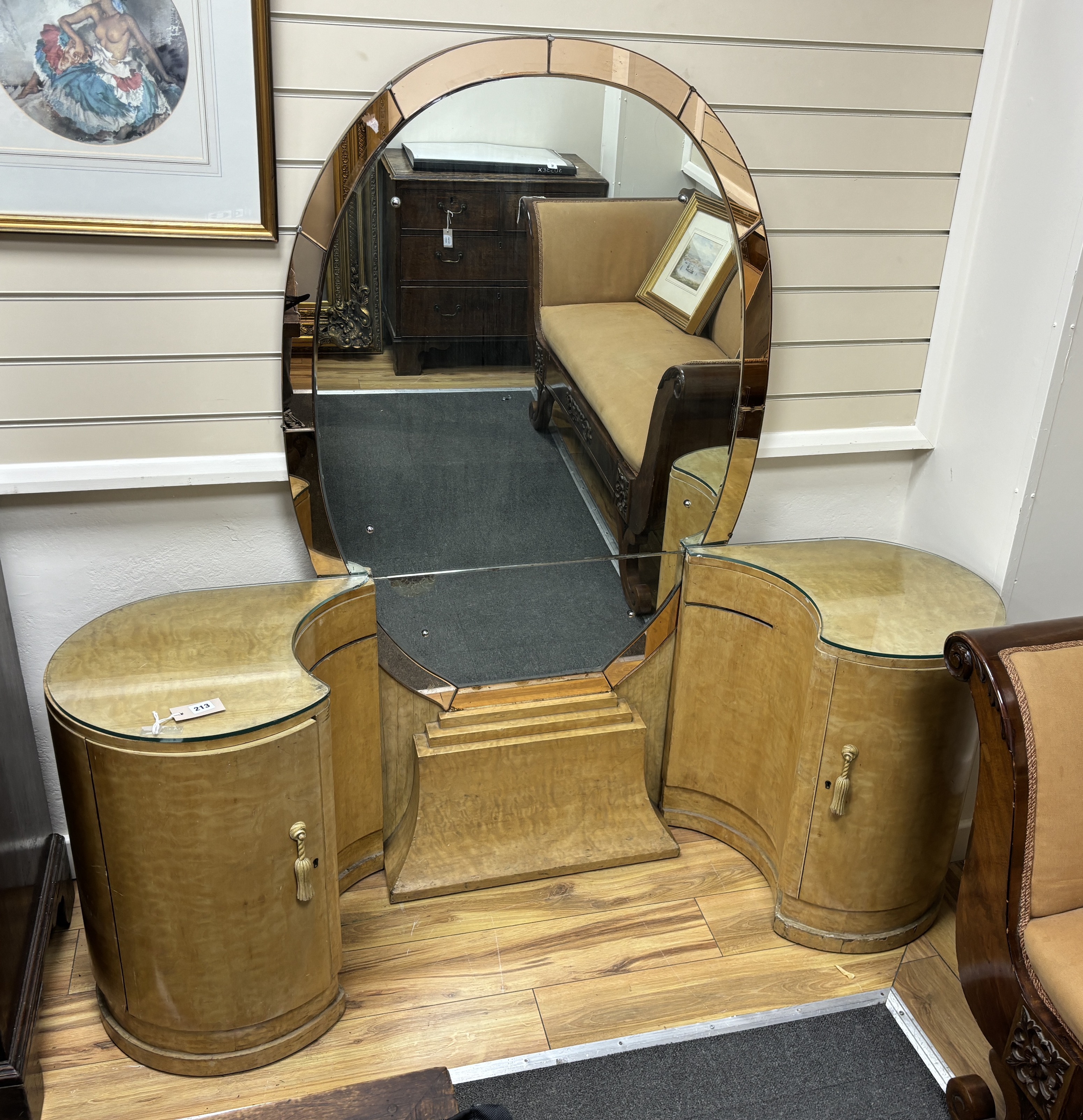 An Art Deco dressing table, width 162cm, depth 45cm, height 154cm. Condition - fair